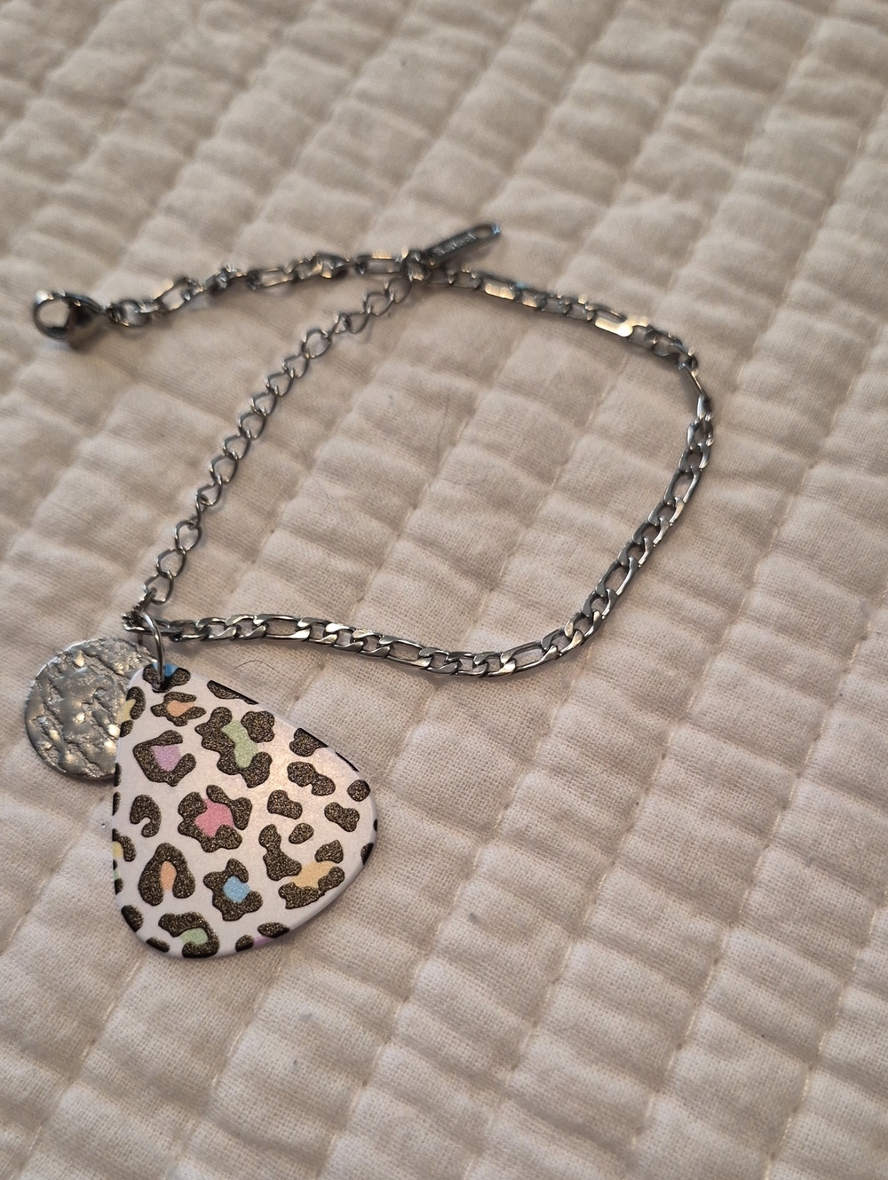 Stainless Steel Bracelet with A Cheetah Print Guitar Pick And Hammered Charm